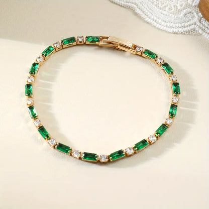 Pulsera Tenis Alternada de Esmeralda en Oro